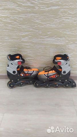 Роликовые коньки