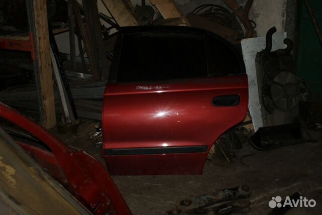 Задняя левая дверь Toyota Carina E вишн металлик