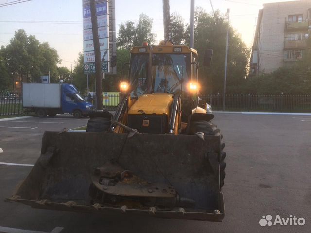 Аренда экскаватора погрузчика с гидромолотом Аренда экскаватора погрузчика с гидромолотом