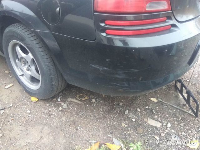 Задний бампер на Додж Стратус 2002 года