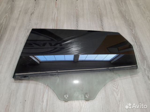 Стекло боковое двери Kia RIO 3 Лев