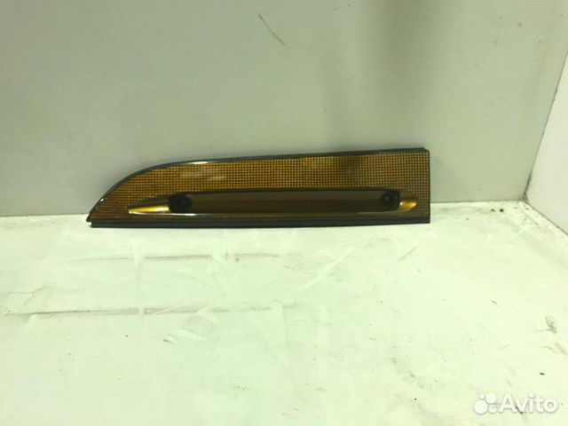 Молдинг фары левый Isuzu Elf 1994-1998