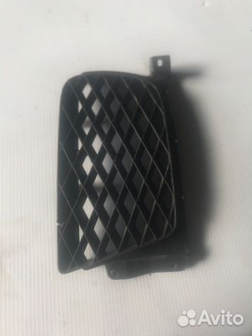 Заглушка бампера передняя правая Mazda Capella