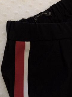 Брюки с полосками