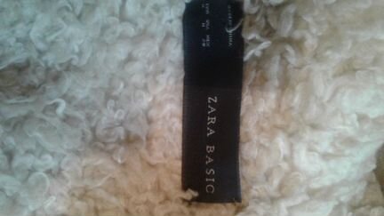 Жилетка с искусственным мехом бренда Зара