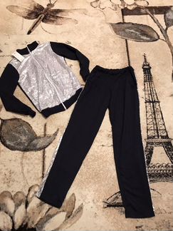 Новый костюм 48-50р