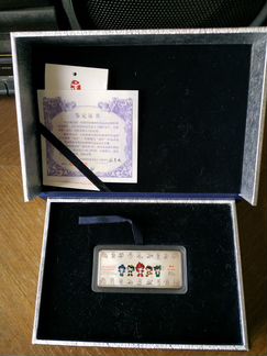 Серебряный памятный знак с талисманами Олимпиады в